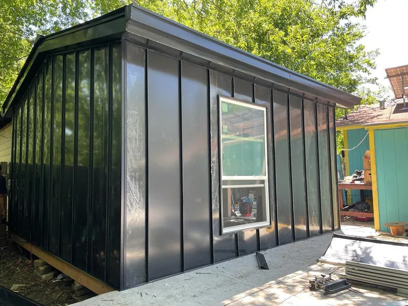 Black standing seam metal wall panels for Roof Inspection in Chesterfield