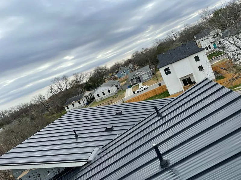 Standing seam metal roof panels with vents for Skylight Repair in Chesterfield